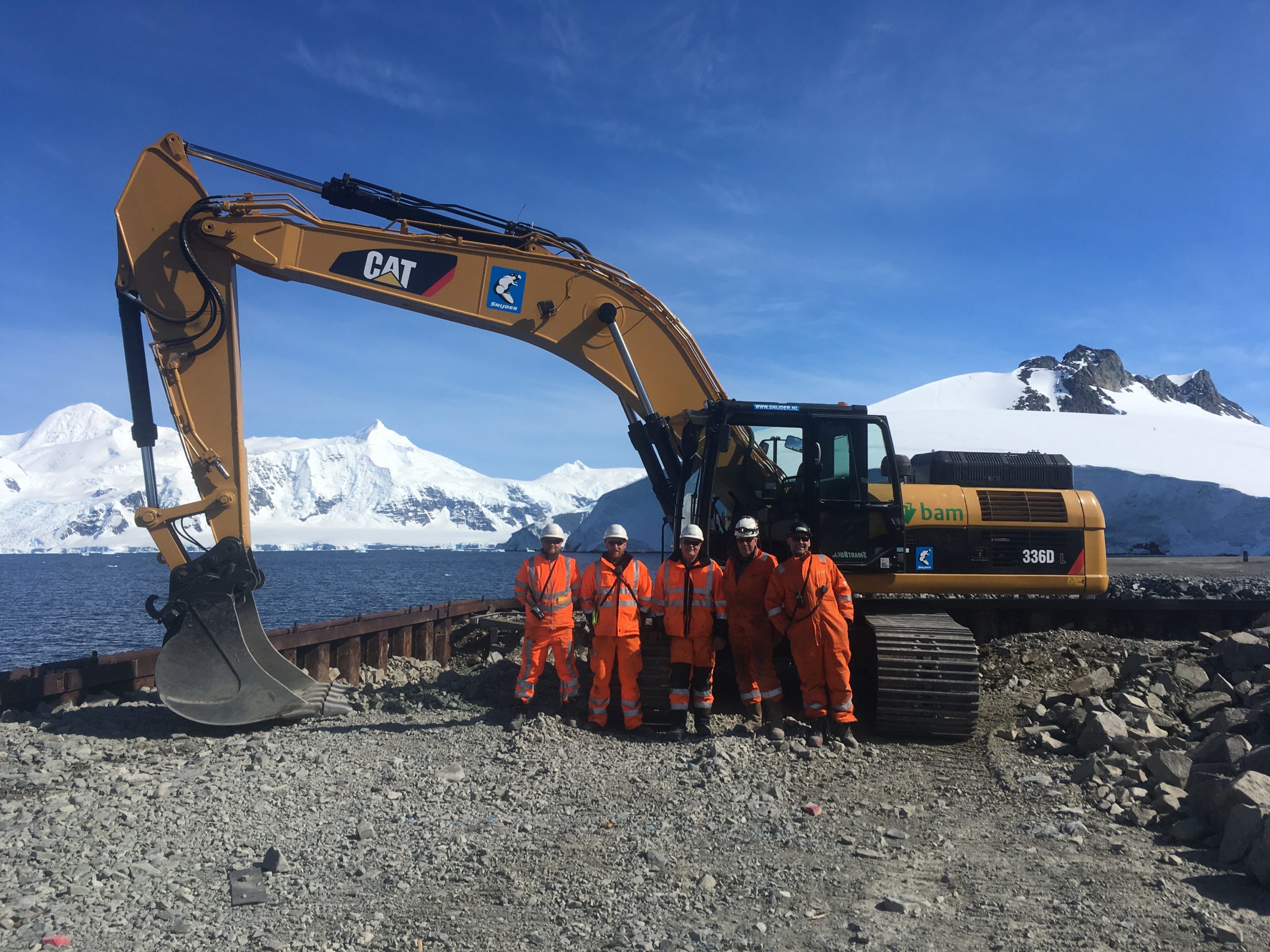 A tractor in the snow.