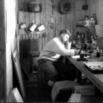 Norman Marshall, zoologist, working in the laboratory, Eagle House, Hope Bay, 22nd October 1945. (Photographer: E. Mackenzie (I.M. Lamb). Archives ref: AD6/19/1/D194)