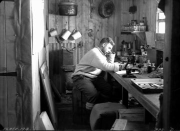 Norman Marshall, zoologist, working in the laboratory, Eagle House, Hope Bay, 22nd October 1945. (Photographer: E. Mackenzie (I.M. Lamb). Archives ref: AD6/19/1/D194)