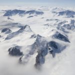 A view of a snow covered mountain.