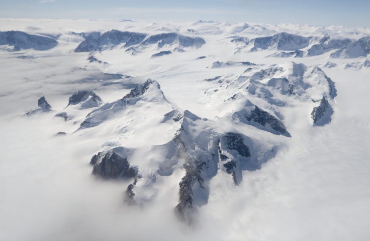 A view of a snow covered mountain.