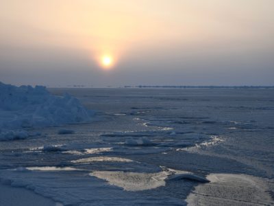 A sunset over a body of water.