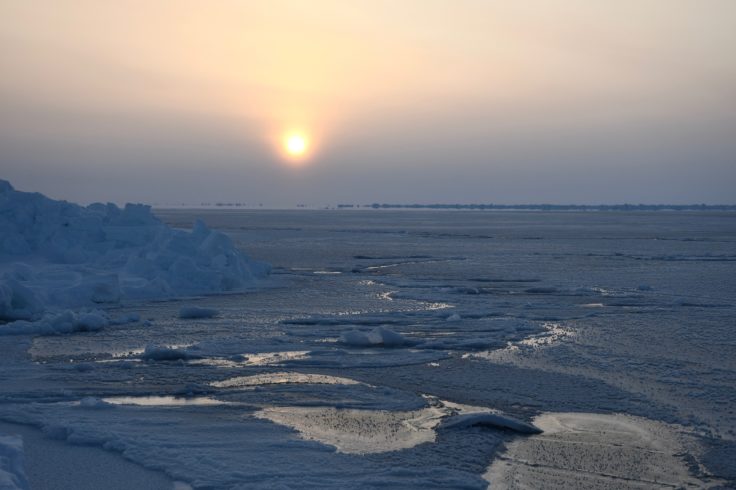 A sunset over a body of water.