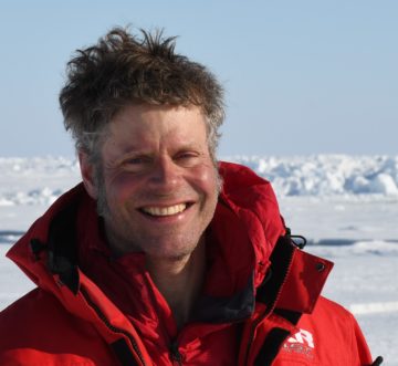 A man smiling for the camera.