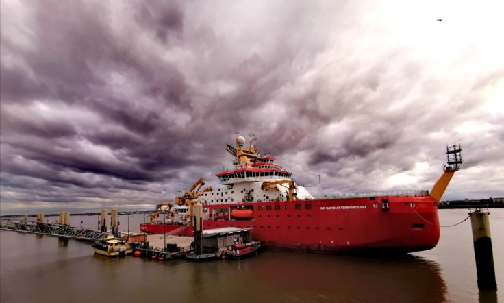 A large ship in a large body of water