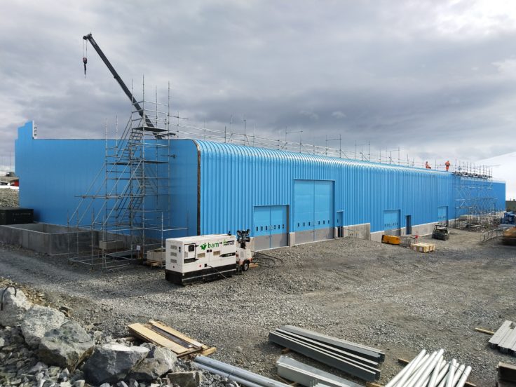 New building with blue cladding on 75% completed