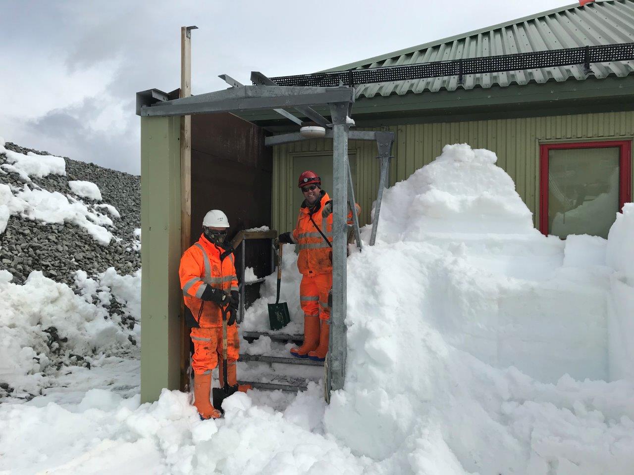 Construction team clearing snow at Rothera Research Station