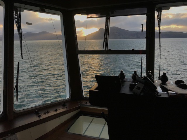 A view of a large body of water in front of a window