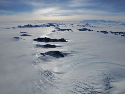 A close up of a snow covered slope