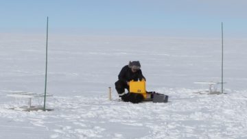 A person that is standing in the snow
