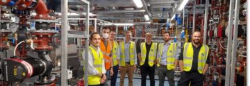 Members of the BAS, BAM and Ramboll Teams stood in the mocked-up Discovery Plantroom