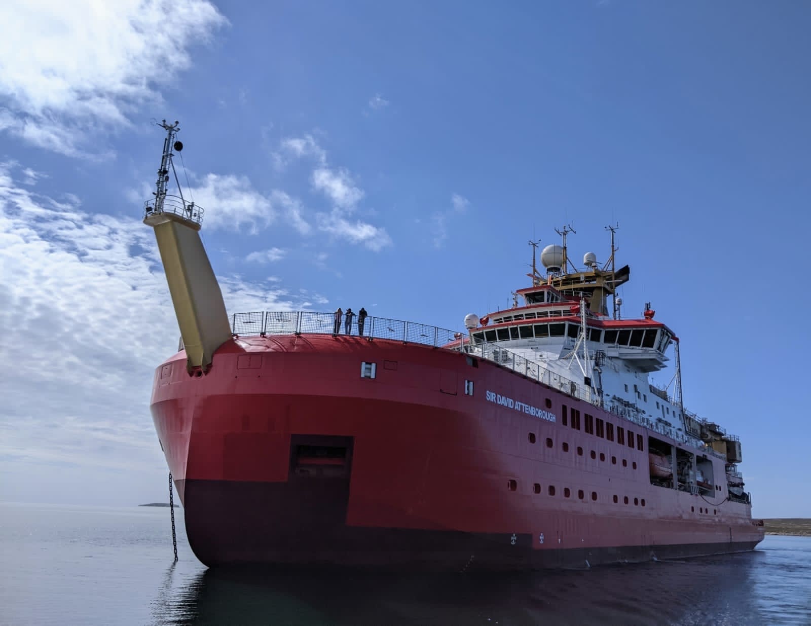 The RRS Sir David Attenborough polar research ship in a body of water in Antarctica