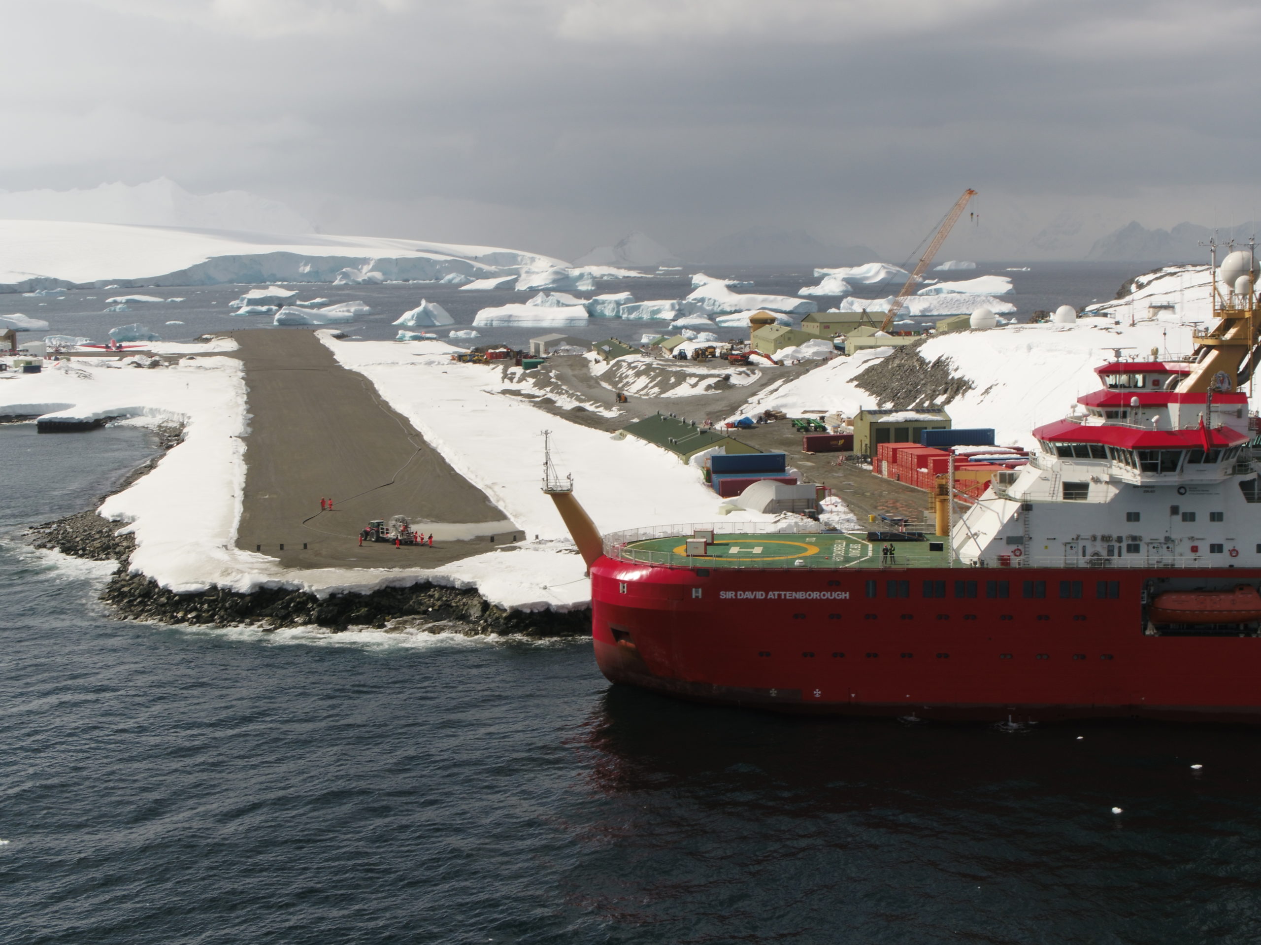 RRS Sir David Attenborough at Rothera Wharf, overlooking the runway