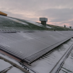 The roof of a building with solar panels