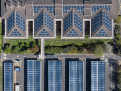 Aerial photo of a range of buildings with solar PV