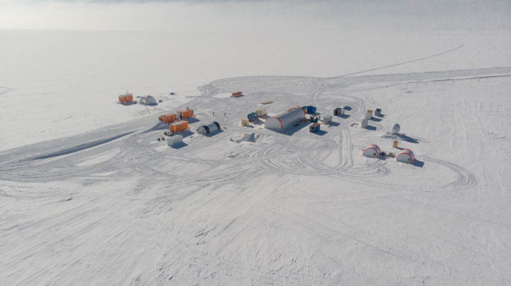 buildings across snow covered ground