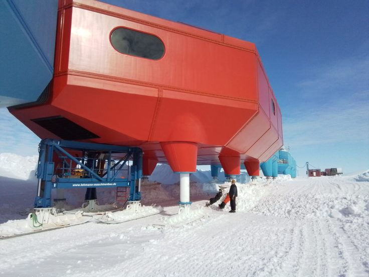 A airplane that is covered in snow