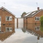 A small house in front of a building