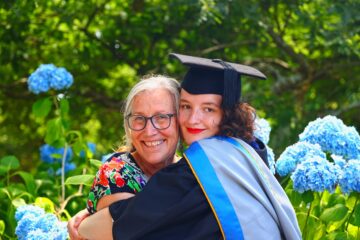 Megan Monkman hugging her mum at her graduation