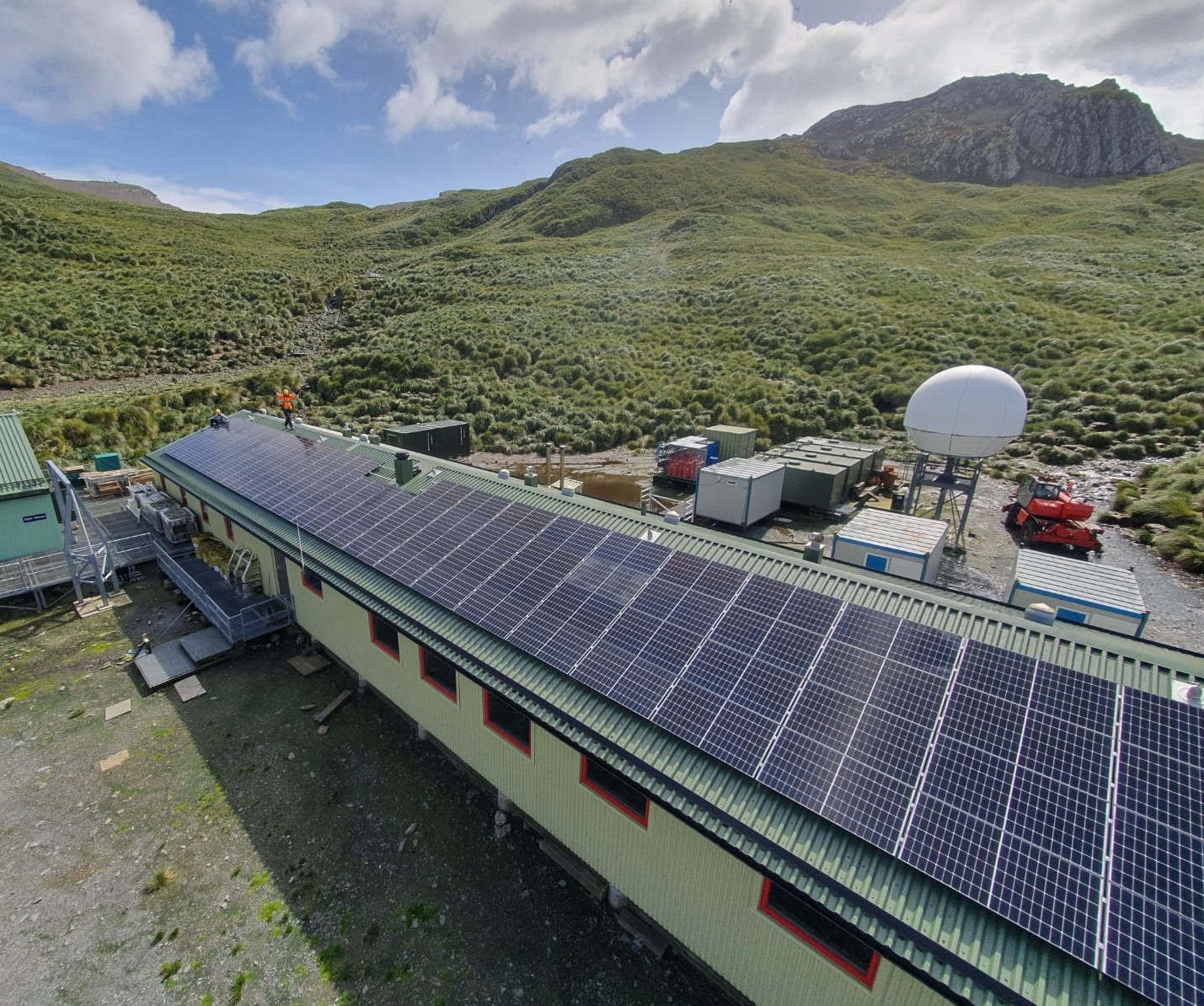 A train is parked on the side of a mountain