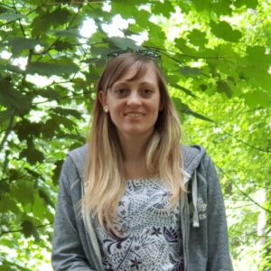 A woman smiling for the camera