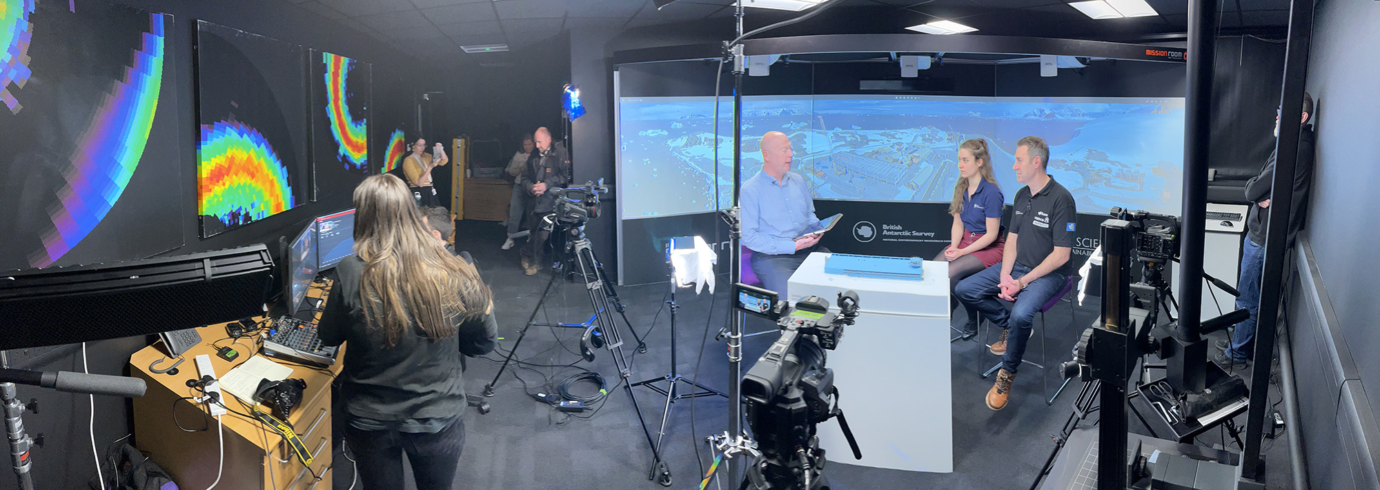 A group of people standing on a stage