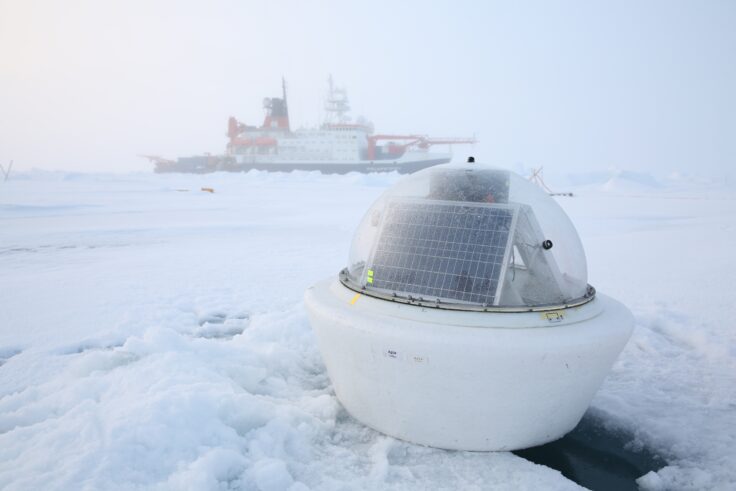 A boat that is sitting in the snow