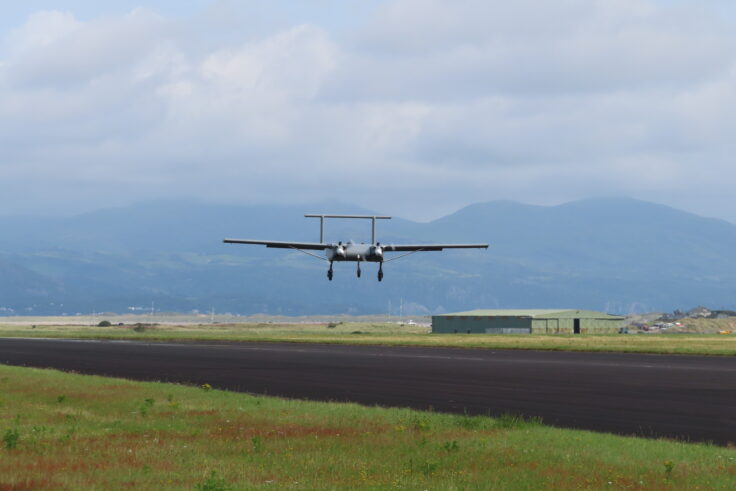 A large air plane on a runway