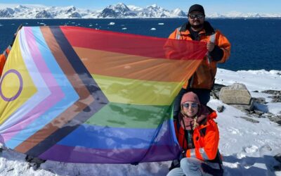 Photo of staff at Rothera Research Station displaying the Pride flag