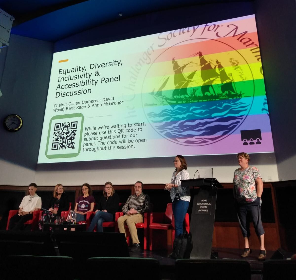 Photo of people talking at a panel event at the Natural History Museum for the EDIA discussion panel