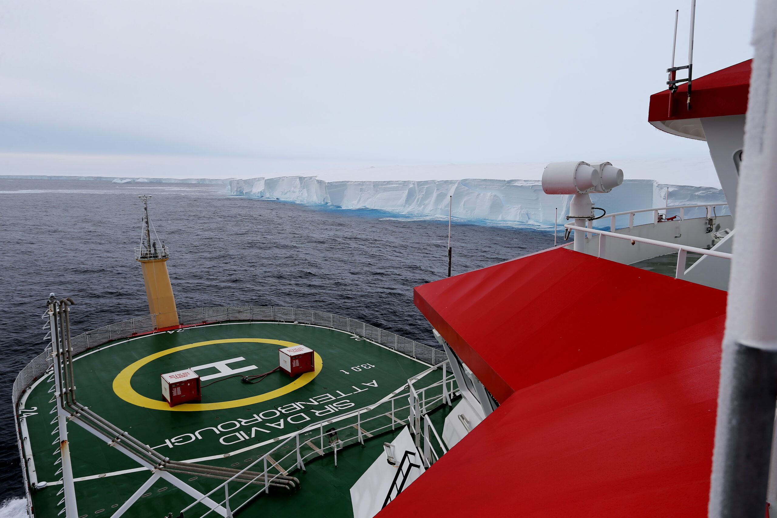 View of the giant iceberg A23a from the deck of the research ship, Sir David Attenborough in Antarctic waters.