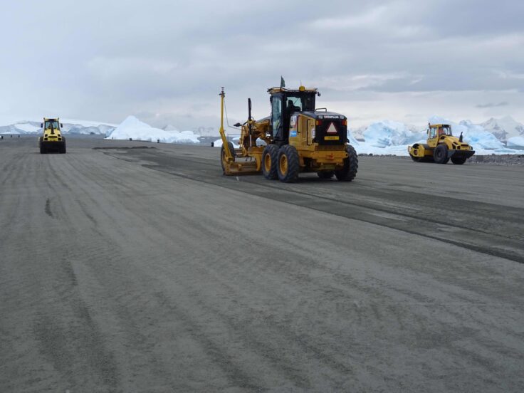 Heavy machinery resurfacing the runway at Rothera Research Station