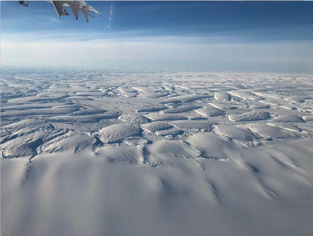 A snowy landscape from the air