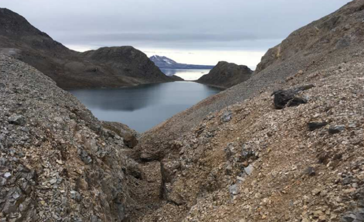 A lake surrounded by mountains