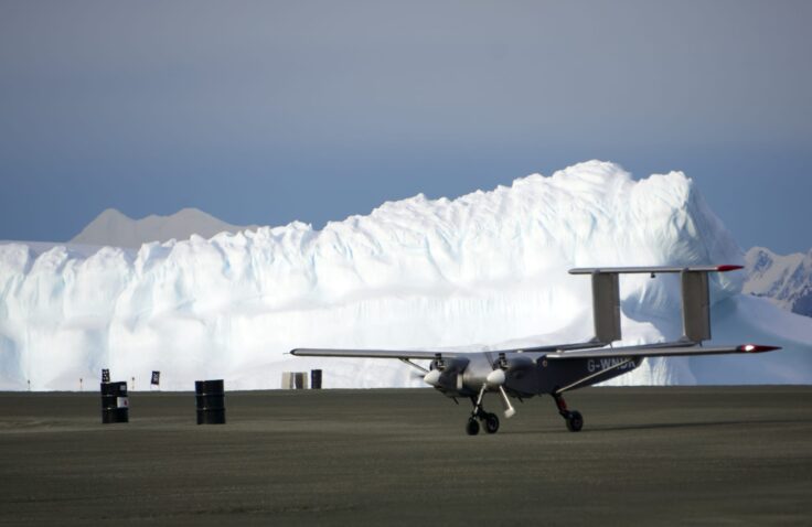 A fighter jet sitting on top of a runway