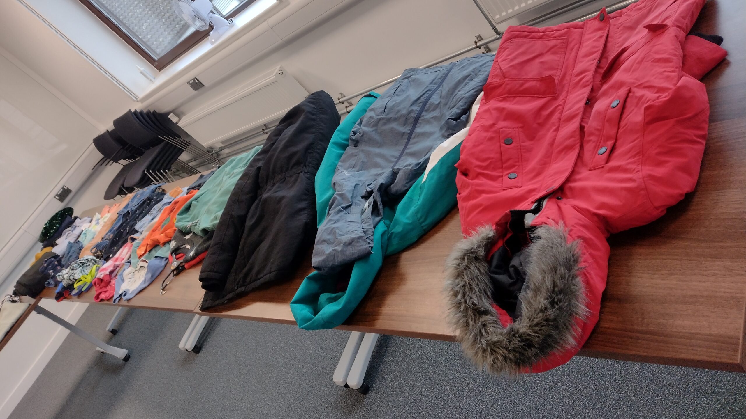 A photo of clothes on a table at British Antarctic Survey