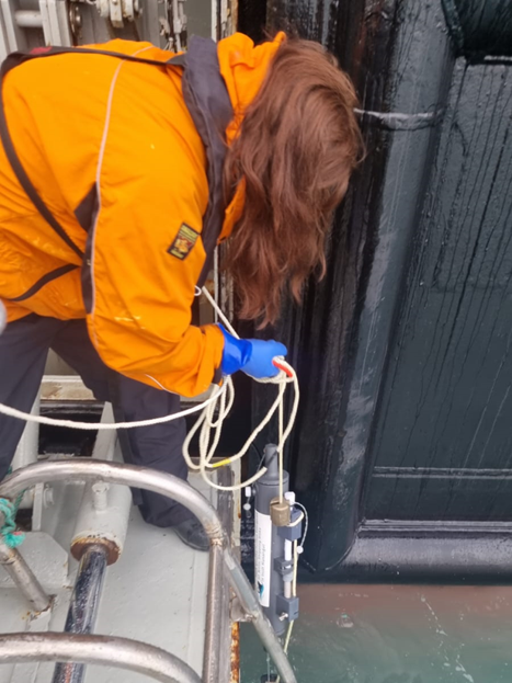 A person riding on the back of a bicycle