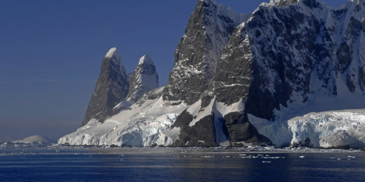 Snow covered mountains in the Lemaire Channel, West Antarctica