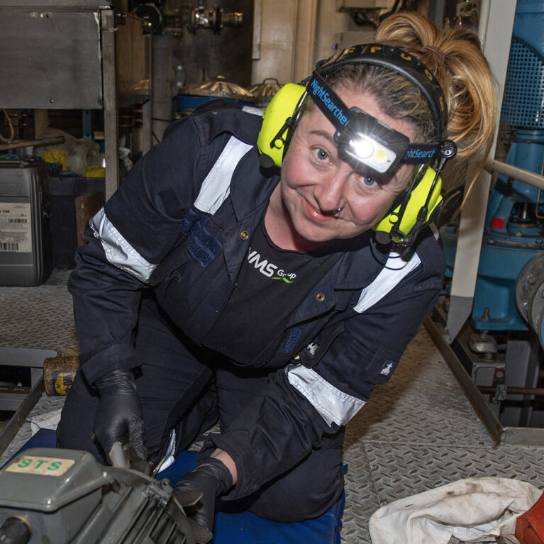 A person sitting posing for the camera