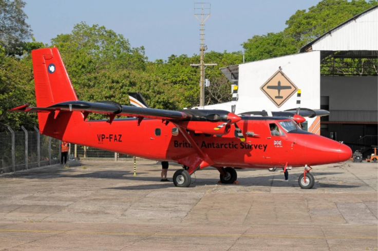 A fighter jet sitting on top of a runway