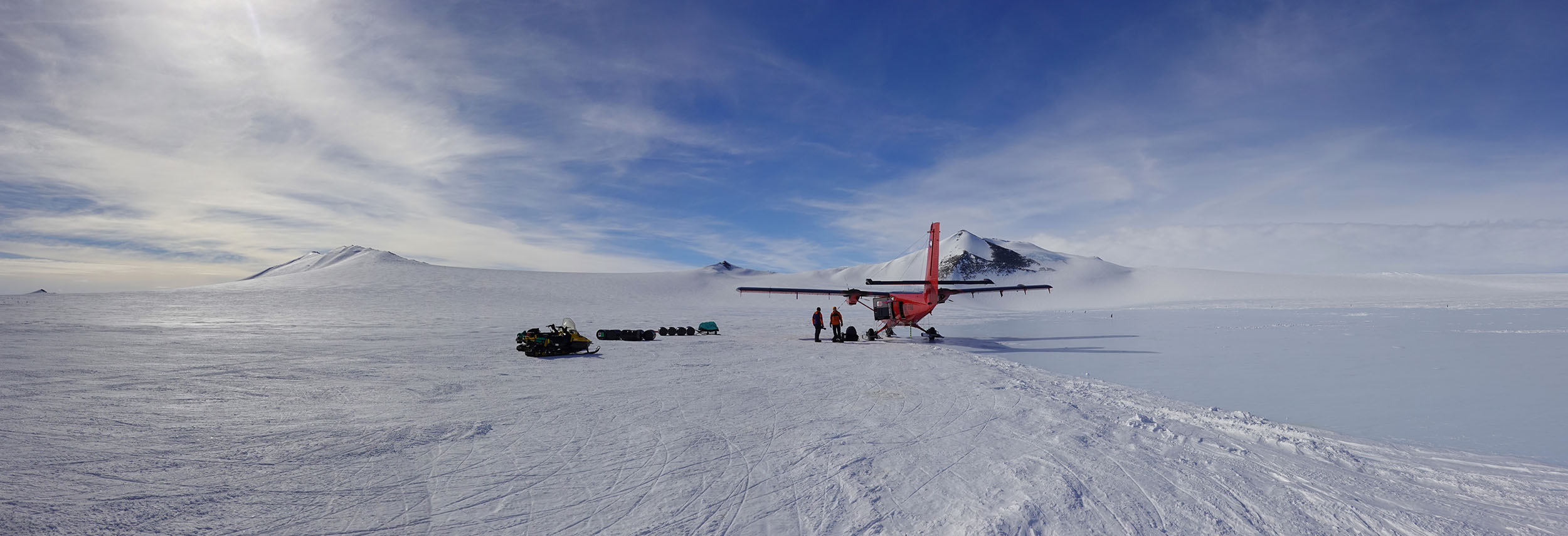 A airplane that is covered in snow