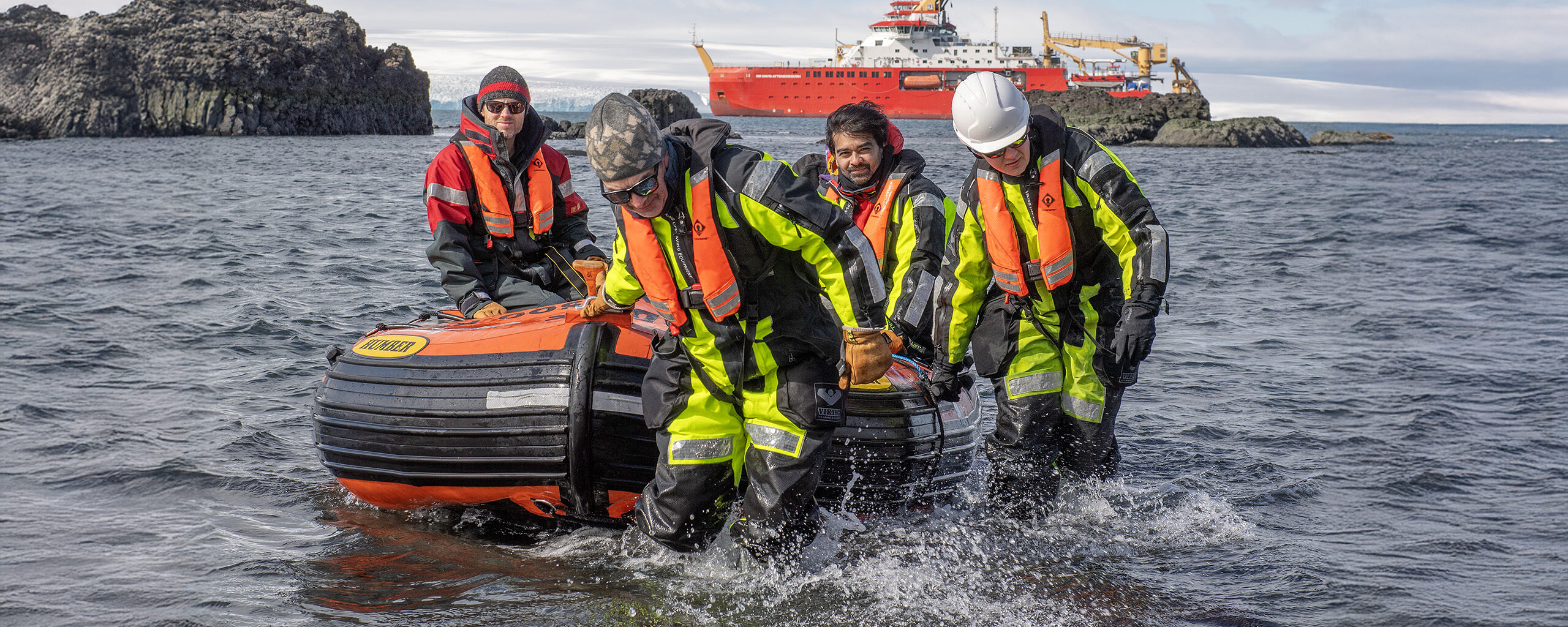 A geological field party shore landing an King George Island, Antarctica