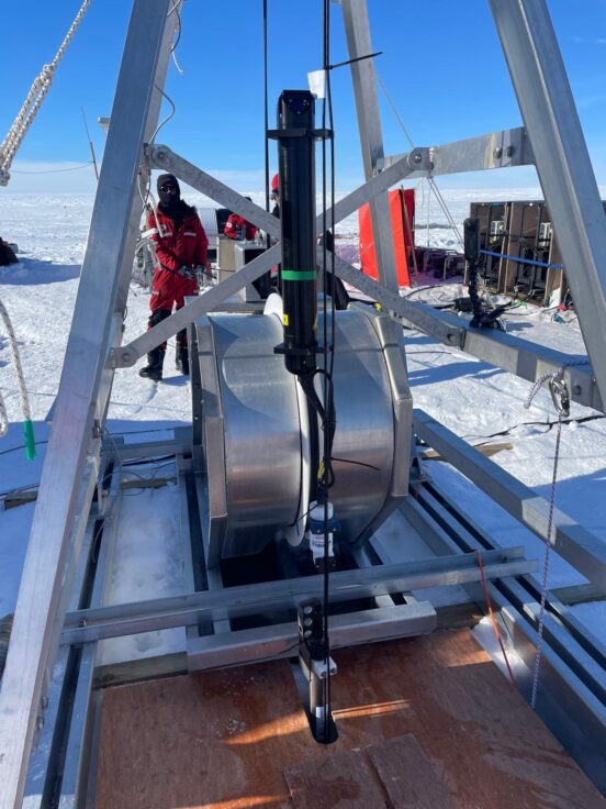 A boat sitting on top of a snow covered bridge