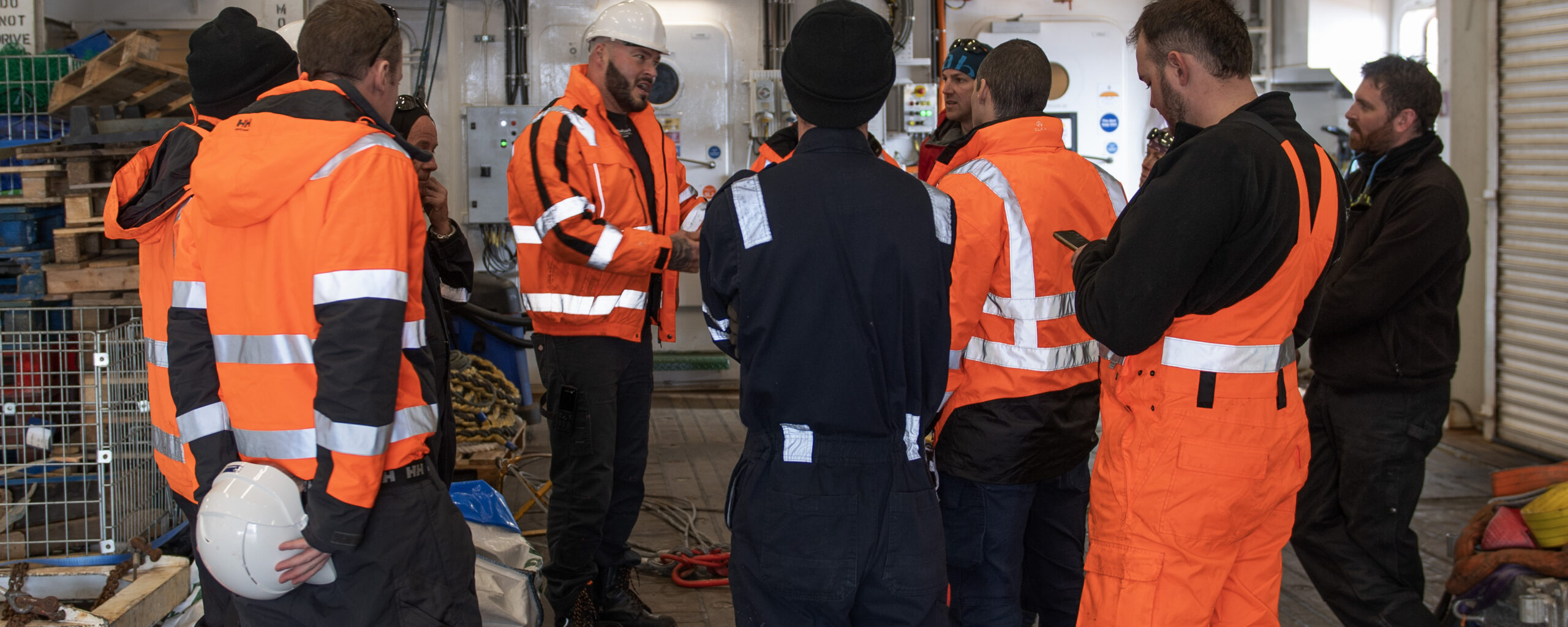 A field deployment planning meeting prior to leaving the RRS Sir David Attenborough