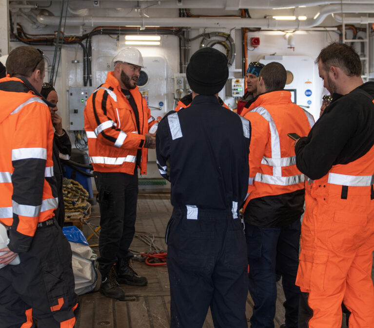 A field deployment planning meeting prior to leaving the RRS Sir David Attenborough