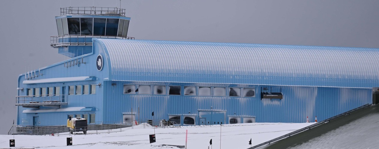 Alarge building covered in snow