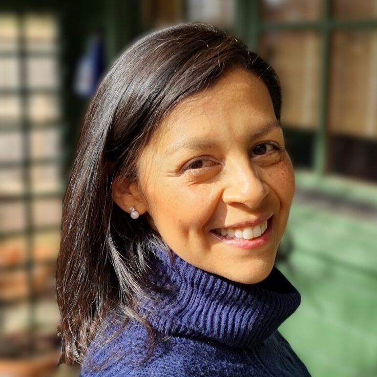A woman smiling for the camera