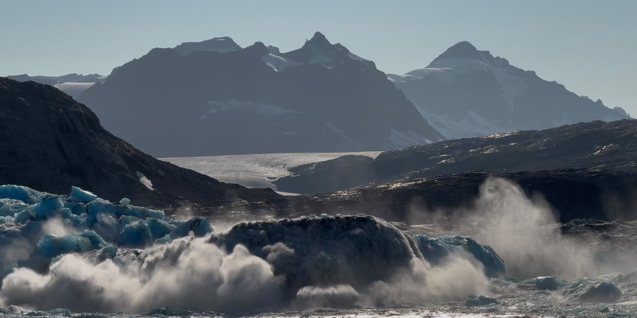 A large mountain in the background