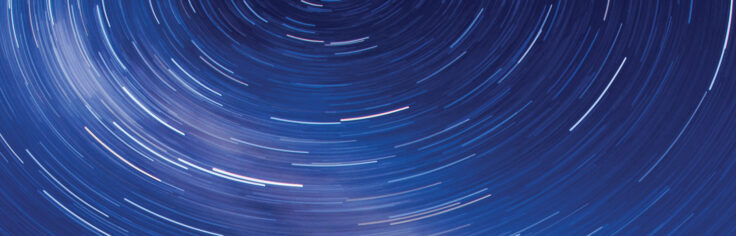 A dark sky with multiple small bands of light